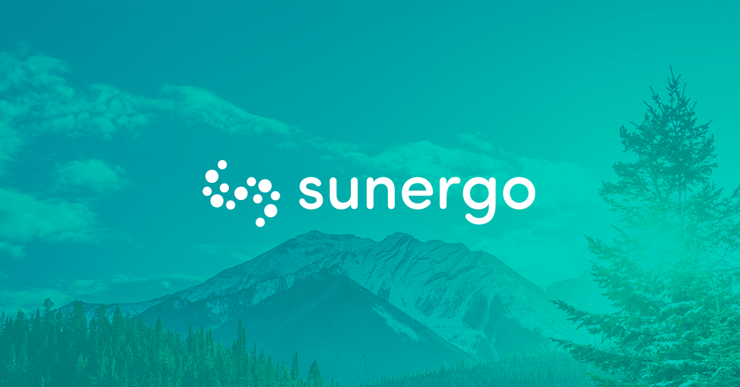 Sunergo Logo over mountains in Banff